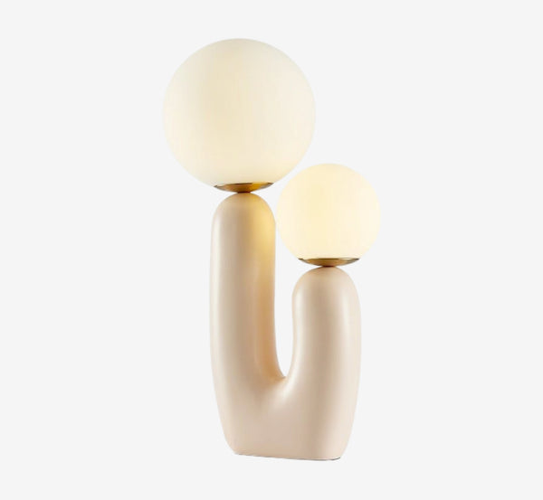Modern Sculptural Cream Table Lamp – Dual Glass Globe Table Light with Organic U-Shaped Ceramic Base