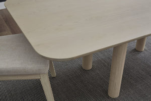 Modern Oak Dining Table – Rounded Rectangle Wood Table with Sculptural Pillar Legs