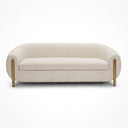 Ivory sofa with brass legs