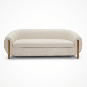 Ivory sofa with brass legs