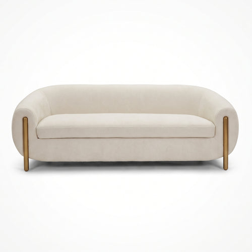 Ivory sofa with brass legs